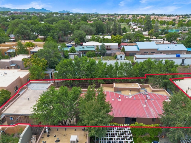 birds eye view of property featuring a mountain view