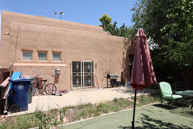 rear view of property with a patio area