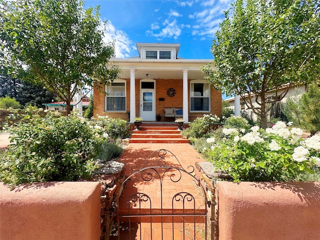 view of front facade featuring covered porch