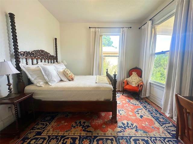 bedroom featuring multiple windows