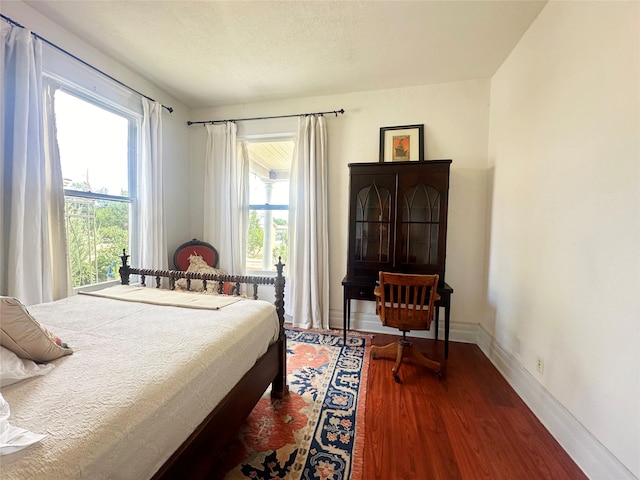 bedroom featuring hardwood / wood-style floors