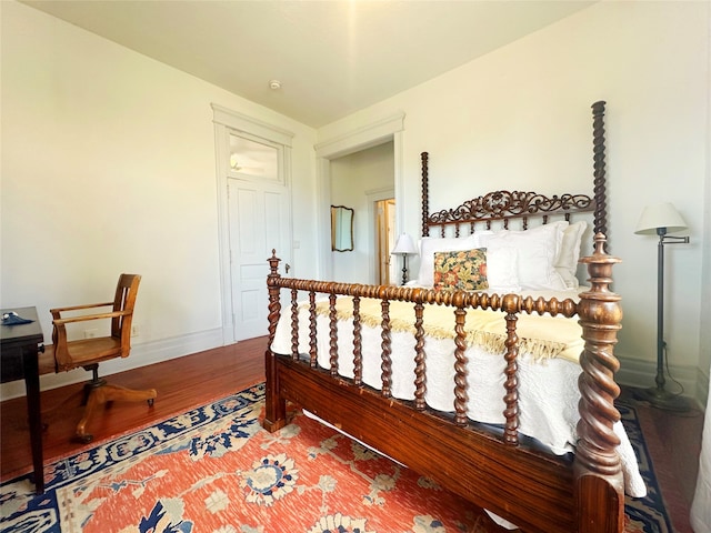 bedroom featuring hardwood / wood-style floors