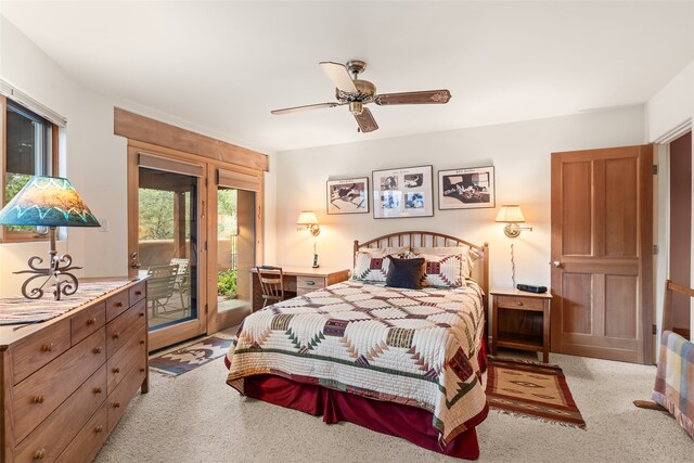 bedroom featuring a ceiling fan and access to exterior