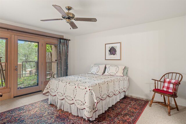 bedroom featuring baseboards, a ceiling fan, and access to exterior