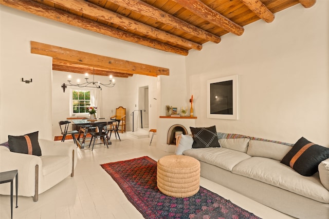 living room with wood ceiling, beam ceiling, and a chandelier