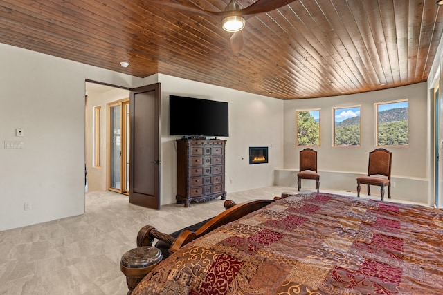 carpeted bedroom featuring wood ceiling