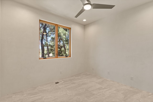 unfurnished room featuring ceiling fan