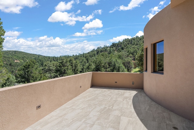 view of patio / terrace with a balcony