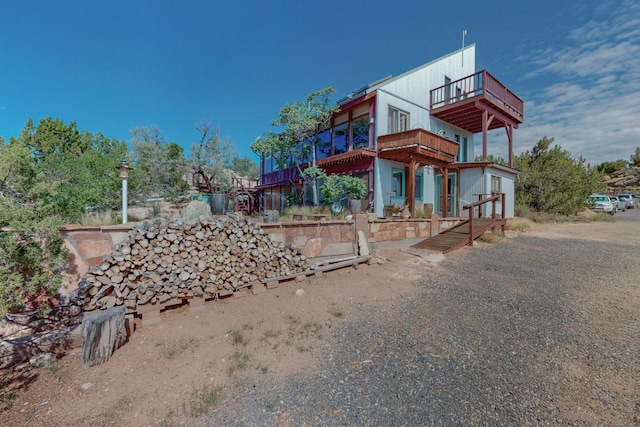 exterior space with a balcony