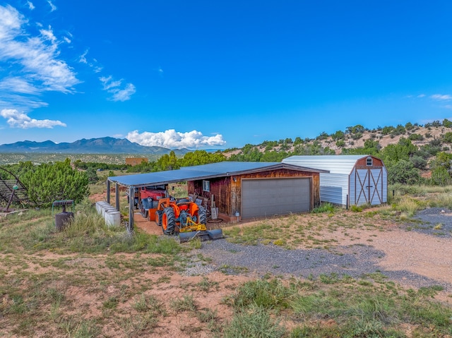 garage featuring a mountain view