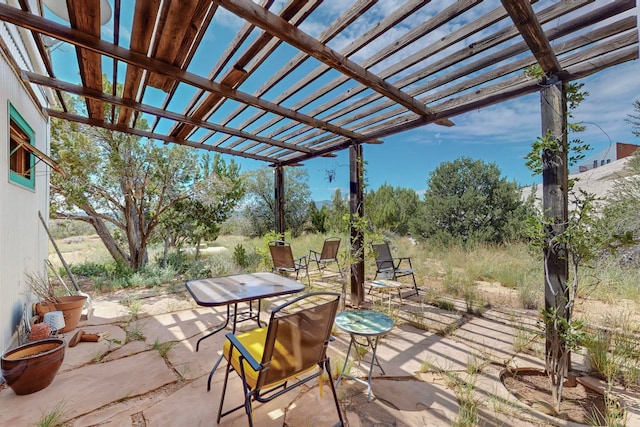 view of patio featuring a pergola