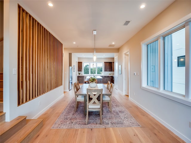 dining room featuring light wood-type flooring