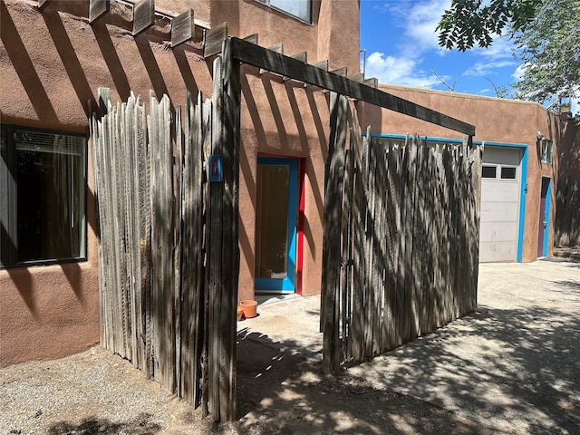 property entrance featuring stucco siding