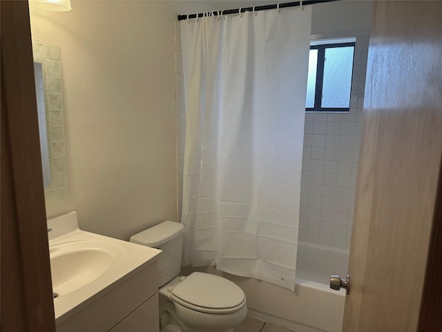 bathroom with toilet, shower / bath combo with shower curtain, and vanity