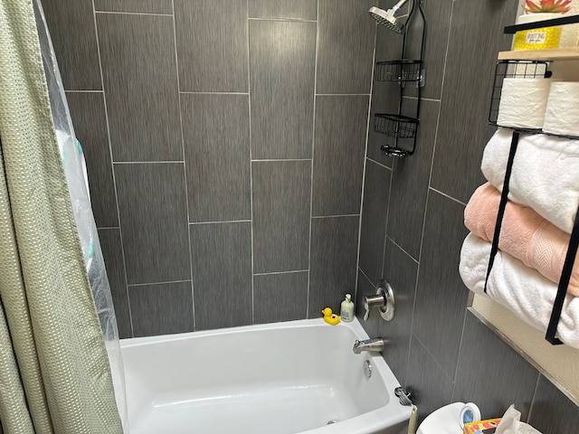 bathroom with shower / bath combo