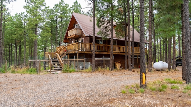 rear view of house with a deck