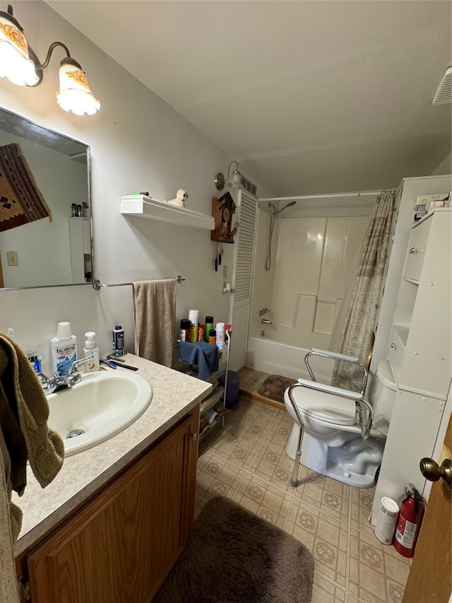 full bathroom featuring vanity, toilet, and shower / bath combination with curtain