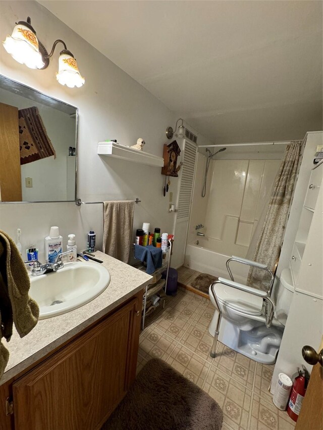 full bathroom featuring vanity, toilet, and shower / bath combo with shower curtain