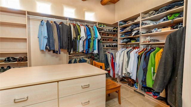 walk in closet featuring light tile patterned floors