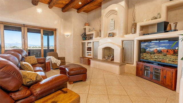 tiled living room featuring a towering ceiling, beam ceiling, and wooden ceiling