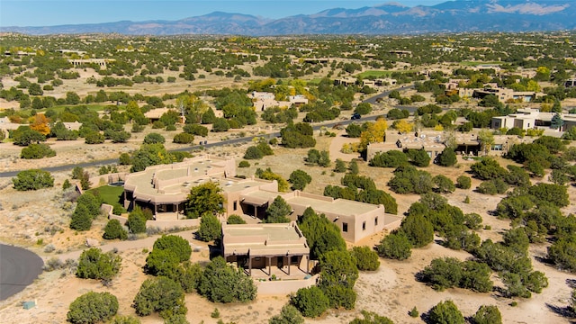 drone / aerial view featuring a mountain view