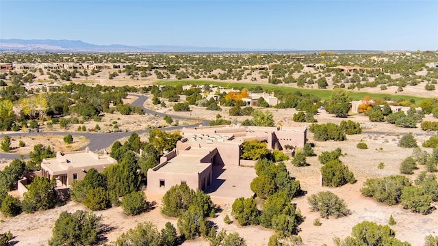 drone / aerial view featuring a mountain view