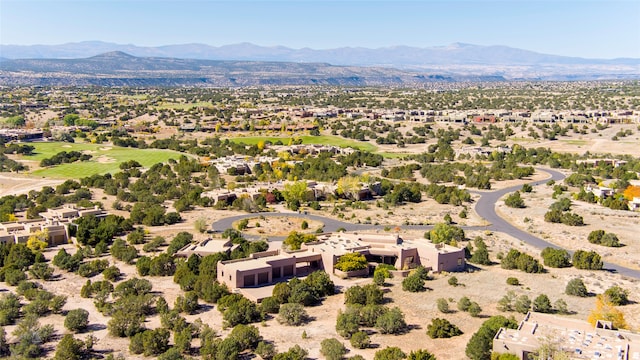 drone / aerial view featuring a mountain view