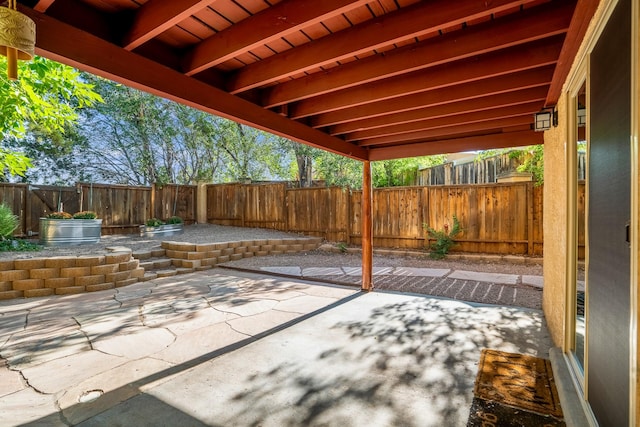 view of patio with a fenced backyard