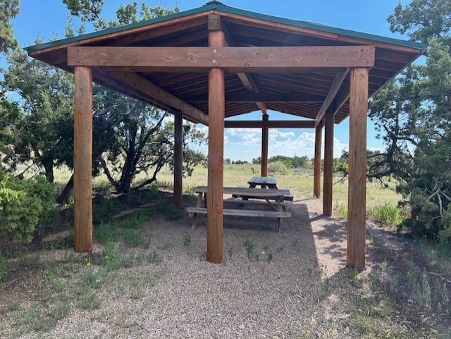 view of yard featuring a detached carport and a gazebo