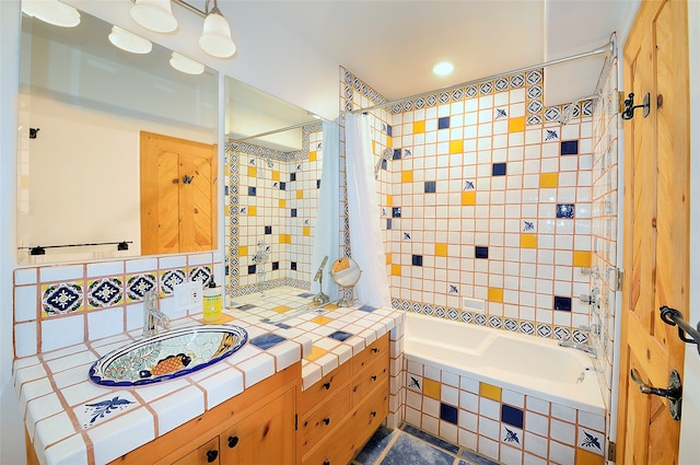 bathroom featuring vanity and shower / bath combo