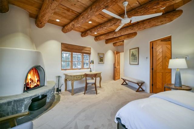 bedroom with wooden ceiling, beamed ceiling, ceiling fan, and carpet flooring