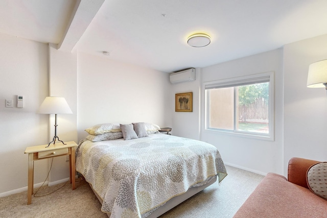 bedroom with carpet, an AC wall unit, and baseboards