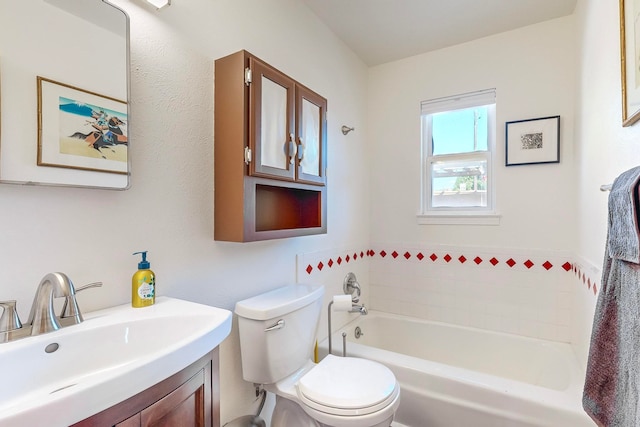 full bath featuring vanity, toilet, and a tub