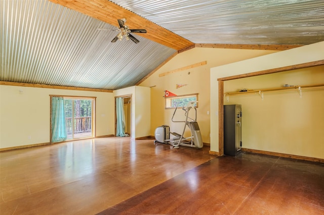 interior space featuring lofted ceiling with beams and ceiling fan