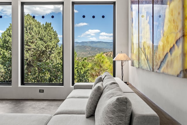 interior space with a mountain view and plenty of natural light