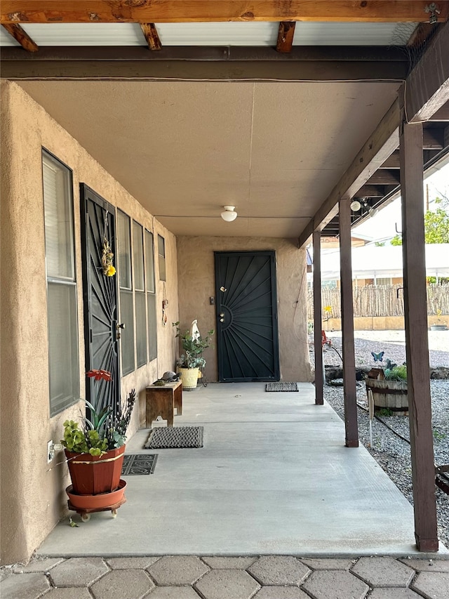 view of patio featuring a porch