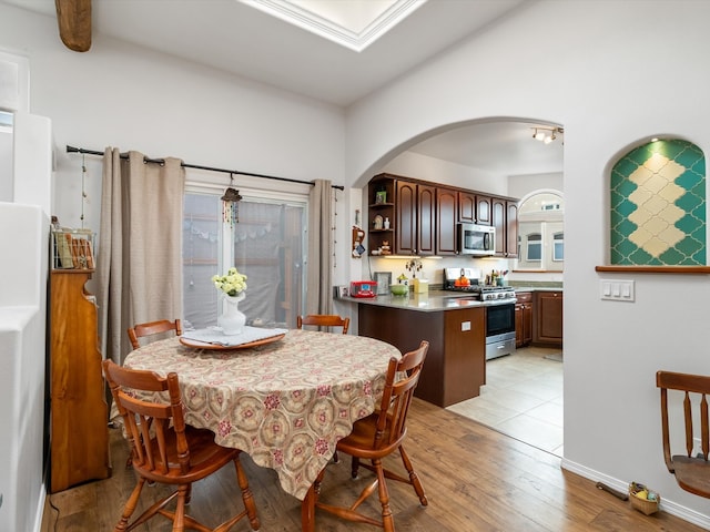 dining room with light wood-type flooring