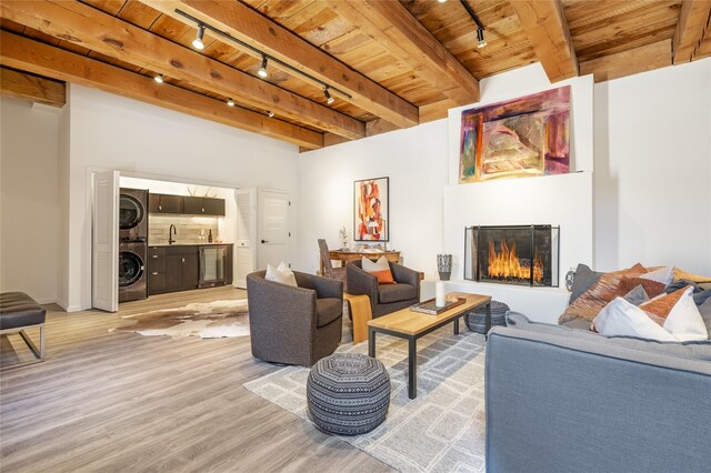 637 Alto St Unit A, Santa Fe, NM 87501 - dining space featuring a wall mounted air conditioner, beamed ceiling, wood ceiling, and a baseboard radiator
