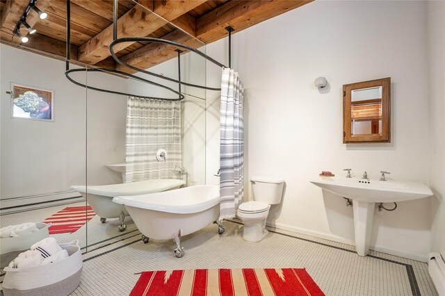 637 Alto St Unit A, Santa Fe, NM 87501 - full bathroom featuring a baseboard heating unit, wooden ceiling, toilet, rail lighting, and a freestanding bath
