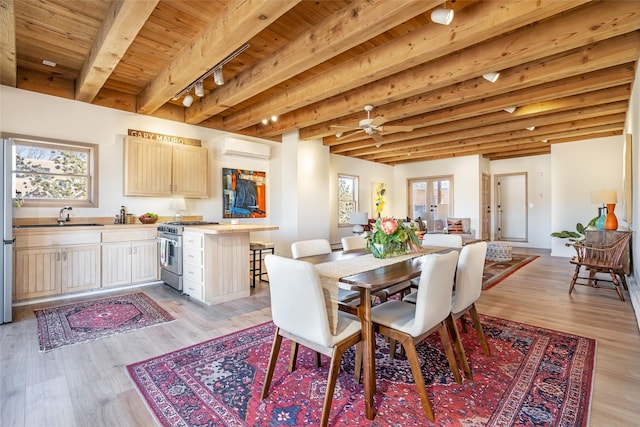 dining area featuring beamed ceiling, a wall mounted AC, wood ceiling, and light wood-type flooring