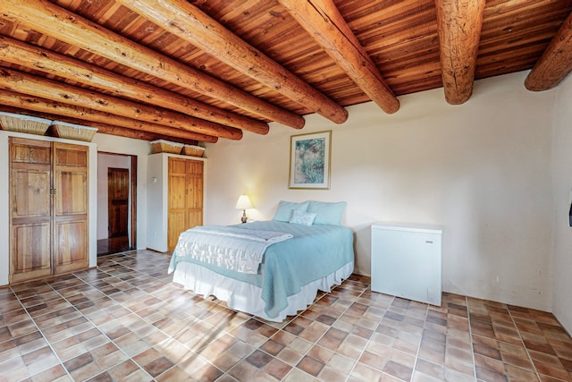 tiled bedroom featuring wood ceiling and beamed ceiling