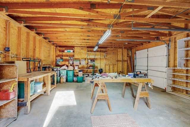 garage with a workshop area