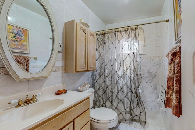 bathroom featuring tile walls, curtained shower, vanity, and toilet