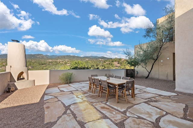 view of patio / terrace with a mountain view