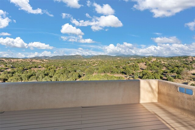 wooden terrace with a mountain view