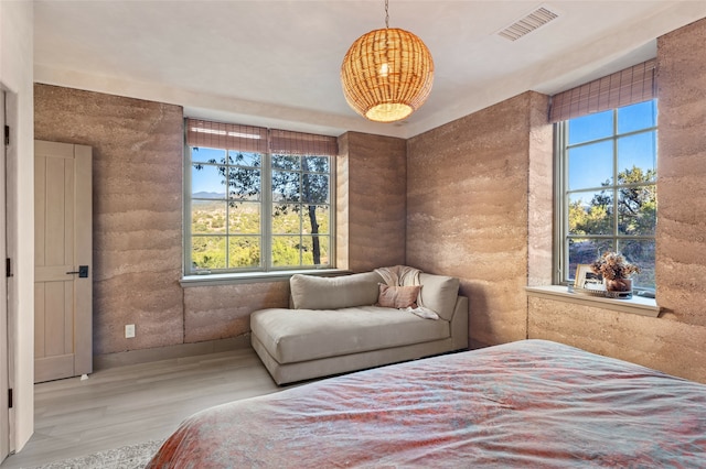 23 Lavadero Rd, Santa Fe, NM 87506 - bedroom with wood finished floors and visible vents