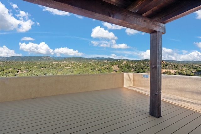 wooden terrace with a mountain view