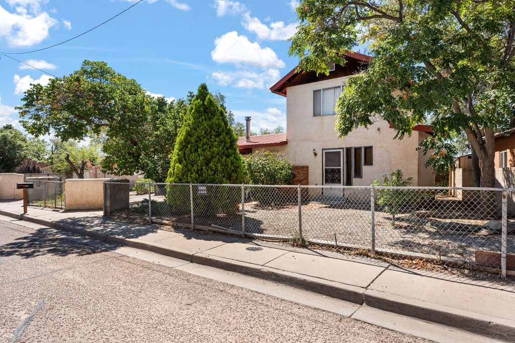 1608 C De Baca Unit C, Santa Fe, NM 87505 - view of front of property with fence private yard and stucco siding