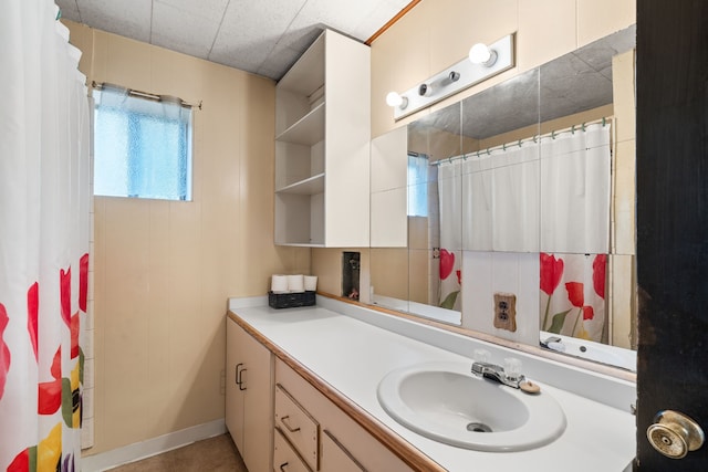 bathroom featuring vanity and a shower with curtain