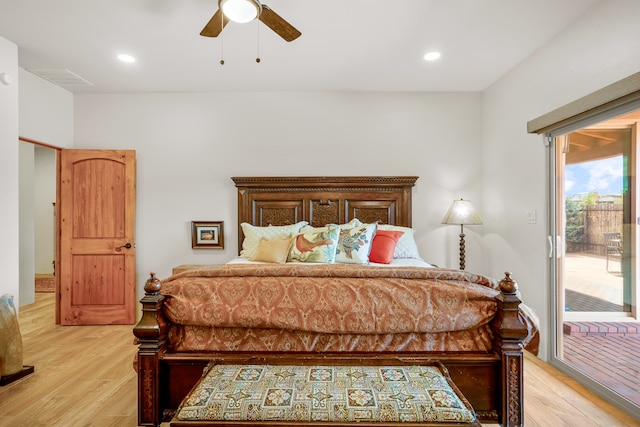 bedroom with recessed lighting, light wood-type flooring, and access to exterior